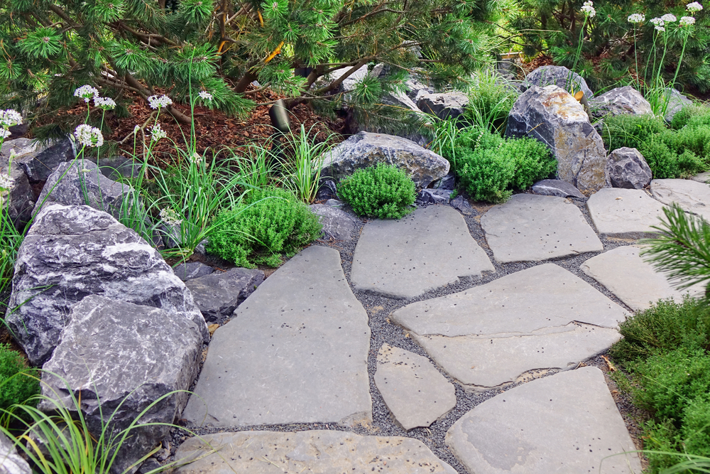 Decorative,garden,with,pathway,or,walkway,from,stone,and,rocks